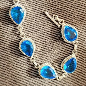 Elegant Silver Bracelet with Blue Gemstones